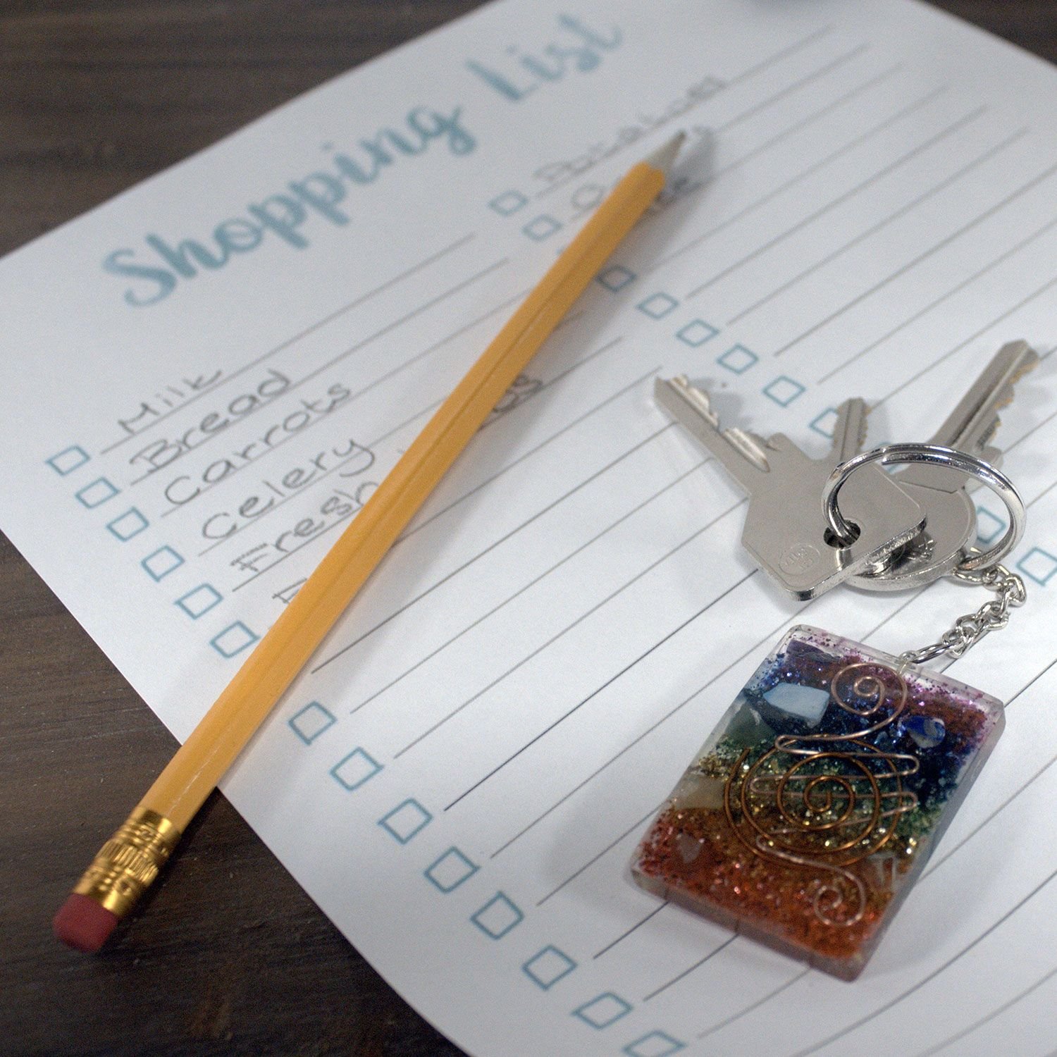 chakra harmony orgonite keyring with buddha Chakra Harmony Orgonite Keyring with Buddha